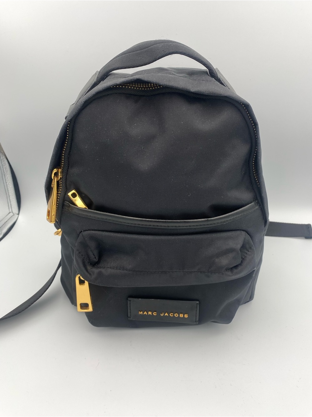 Marc Jacobs Black Mini Backpack with Gold Hardware Accents